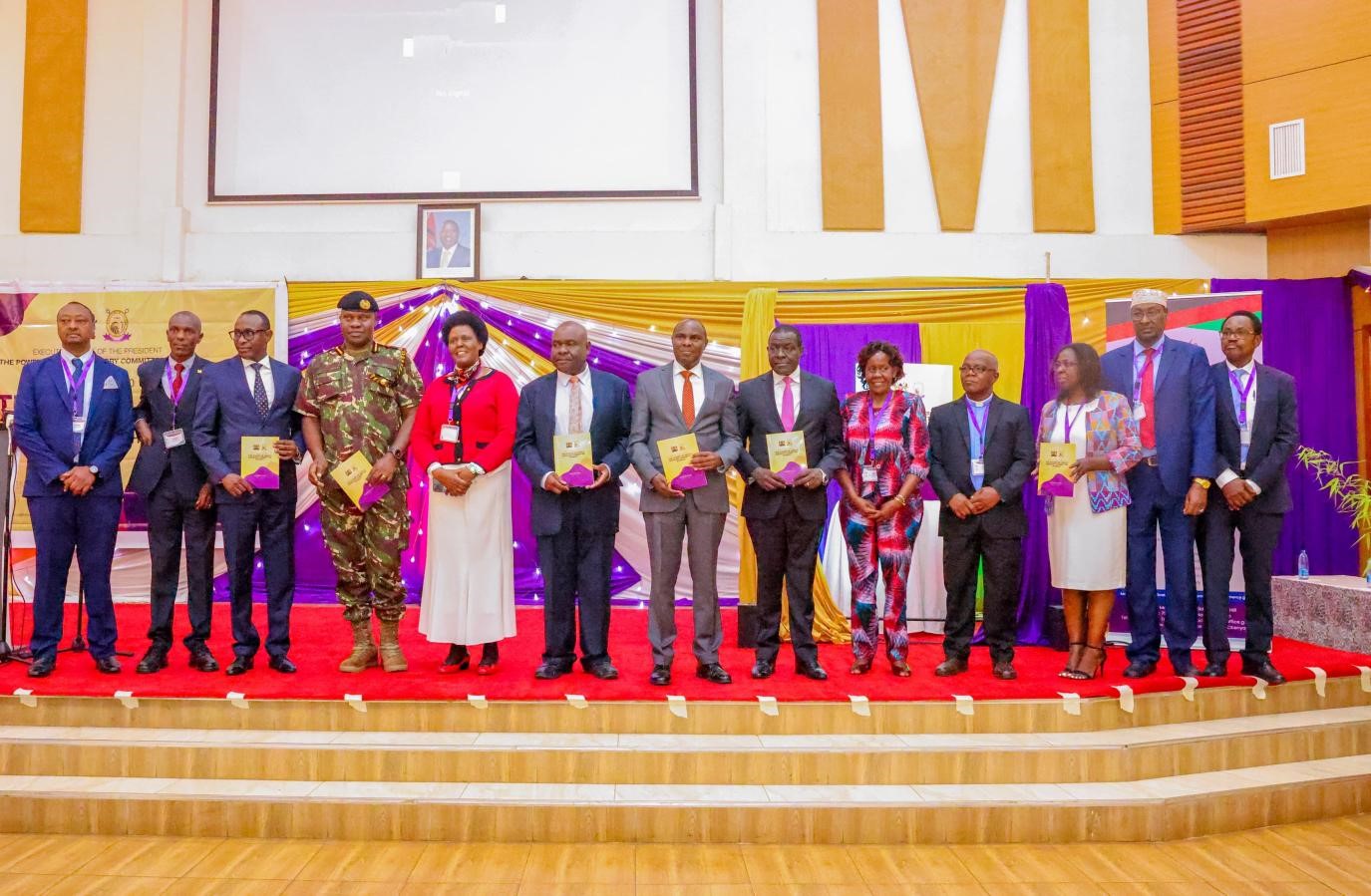 The Head of Public Service Mr. Felix Koskei (centre), flanked by members of the Power of Mercy Advisory Committee members and other dignitaries during the launch of POMAC 2024-2028 Srategic Plan 