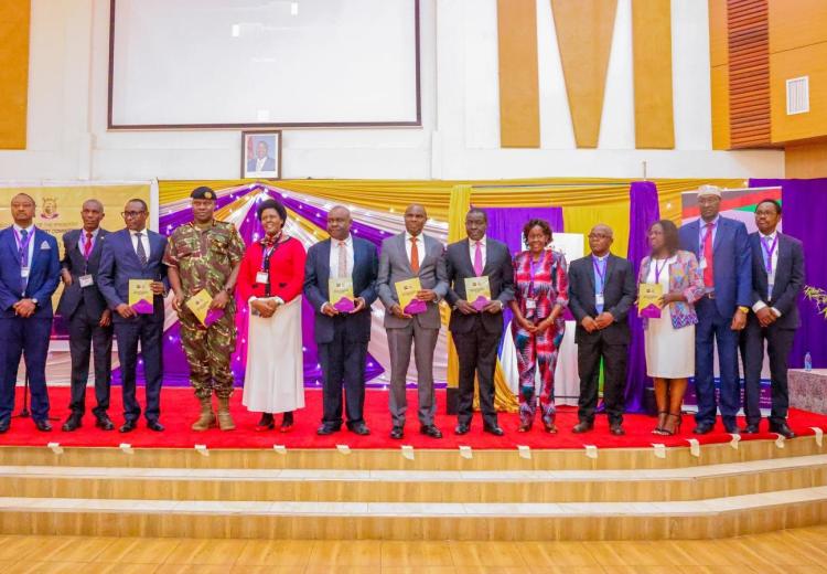 The Head of Public Service Mr. Felix Koskei (centre), flanked by members of the Power of Mercy Advisory Committee members and other dignitaries during the launch of POMAC 2024-2028 Srategic Plan 